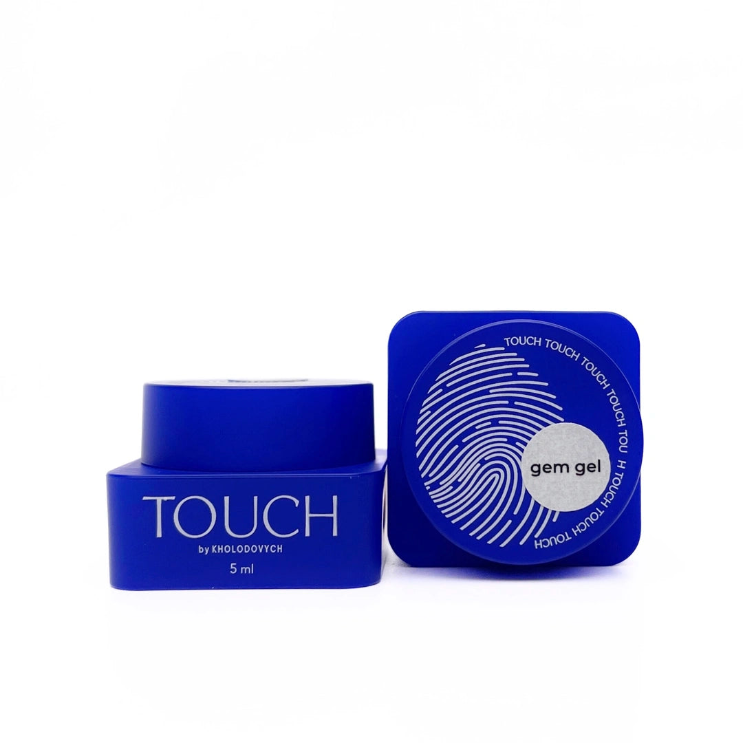 Blue cosmetic jar and cap with 'TOUCH' branding on a white background