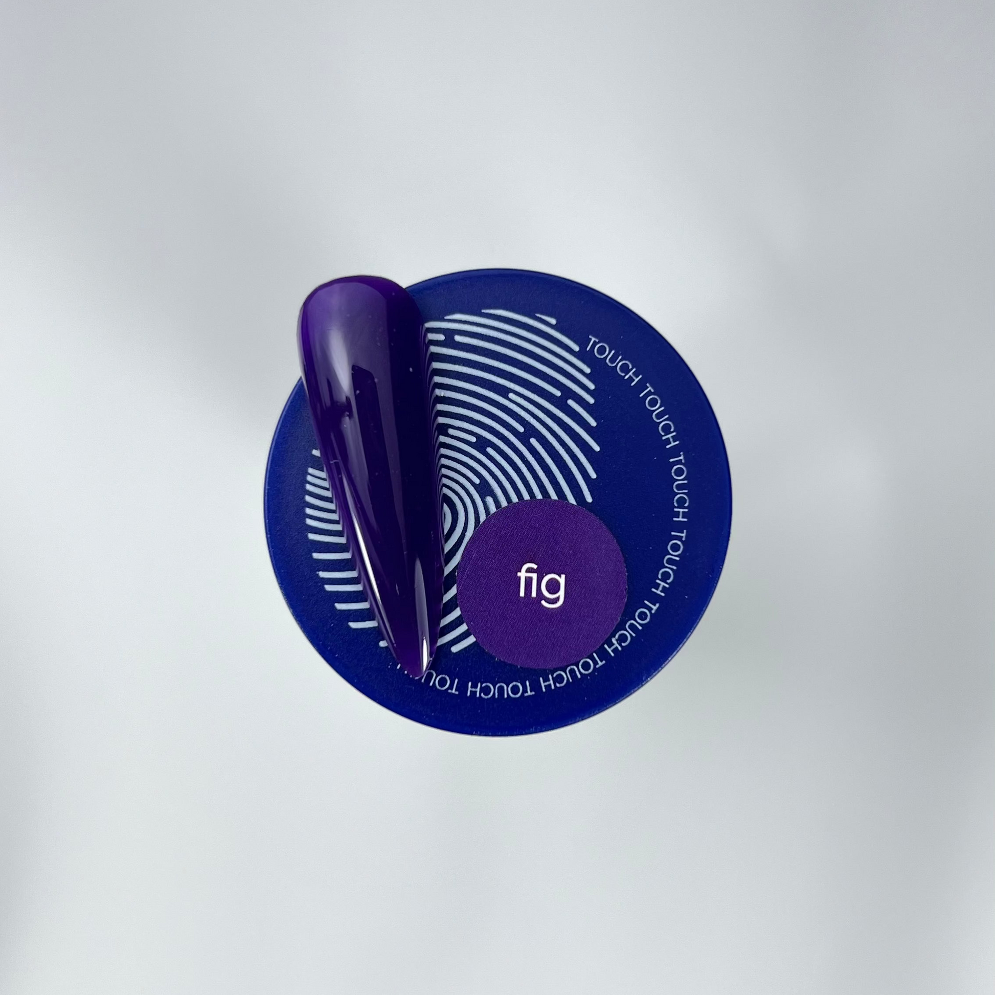 fig colour nail swatch and blue jar