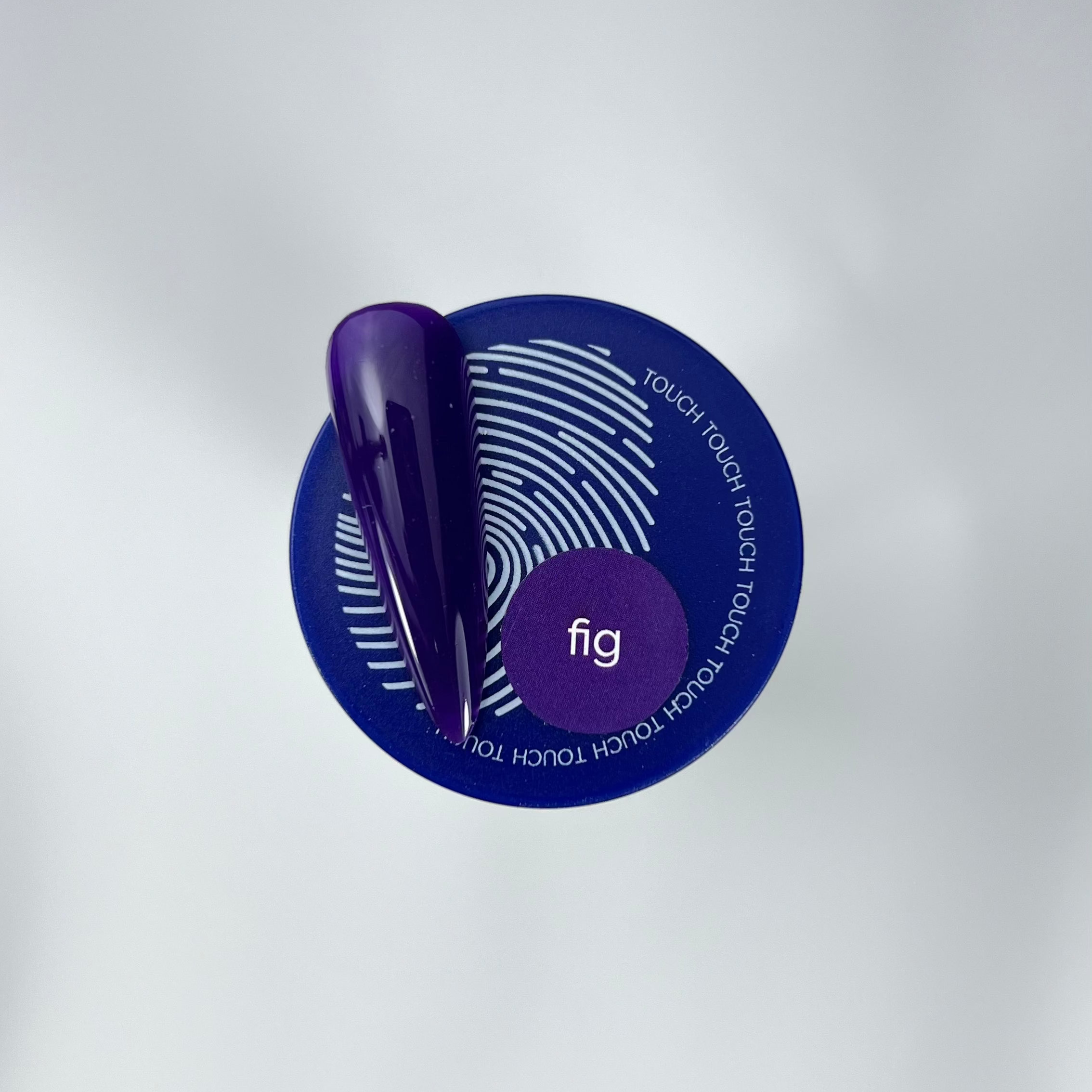 fig colour nail swatch and blue jar
