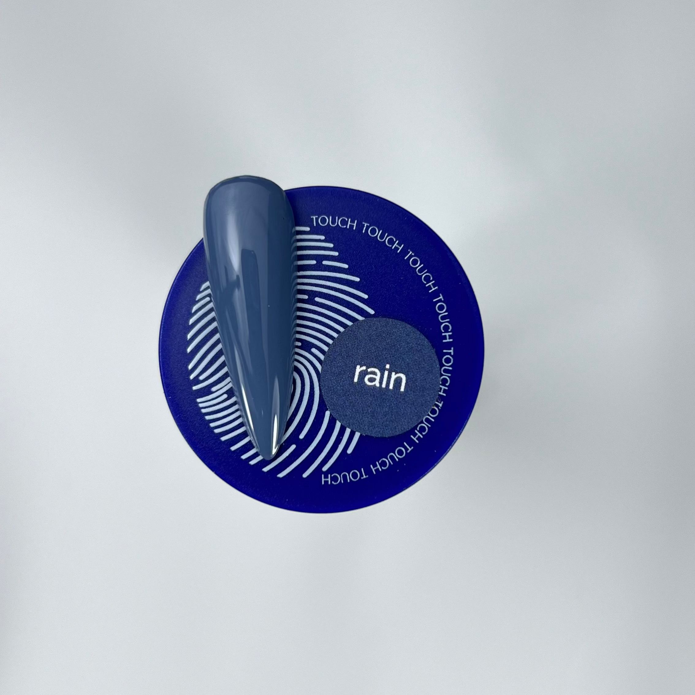 blue colour nail swatch and blue jar