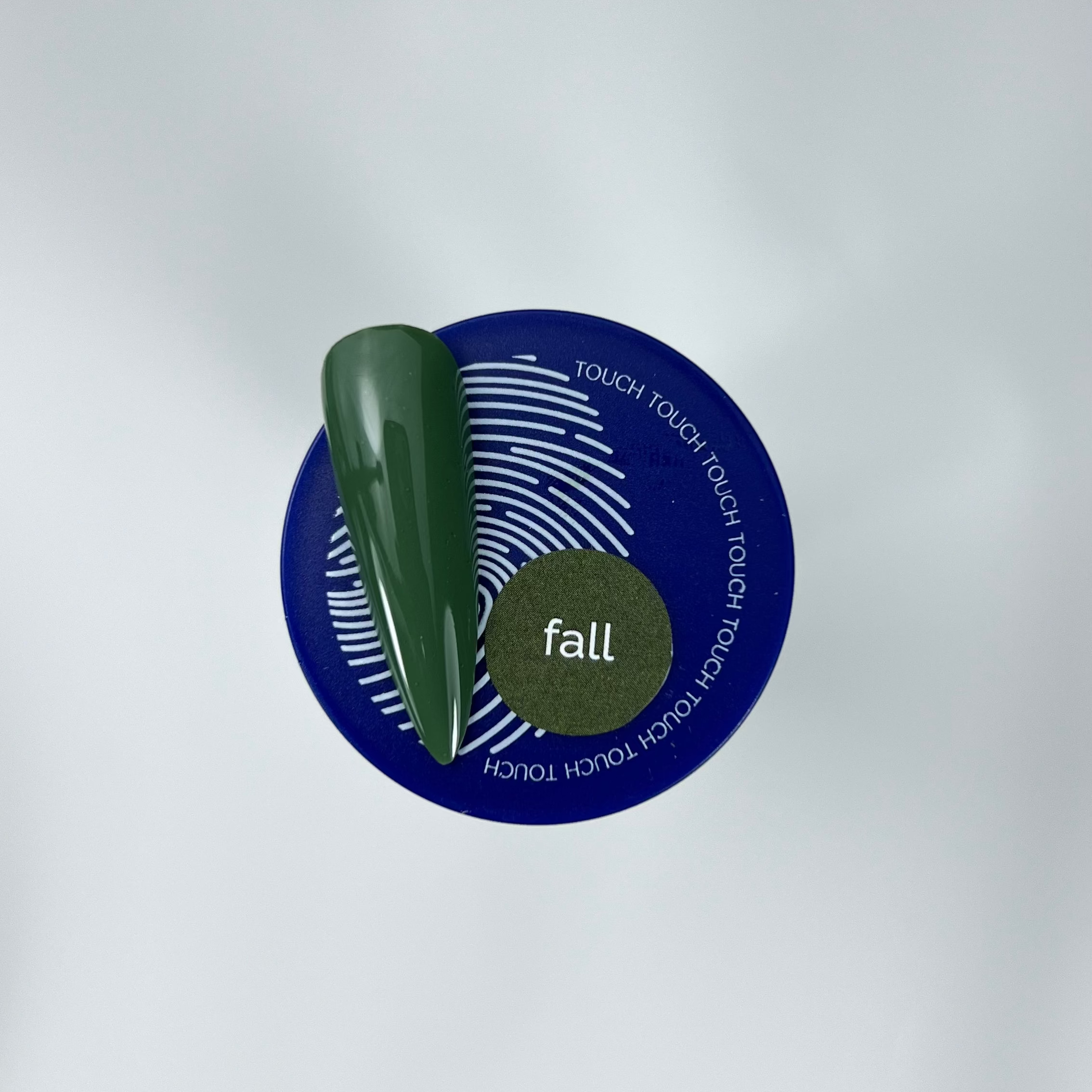 Touch green colour nail swatch and blue jar