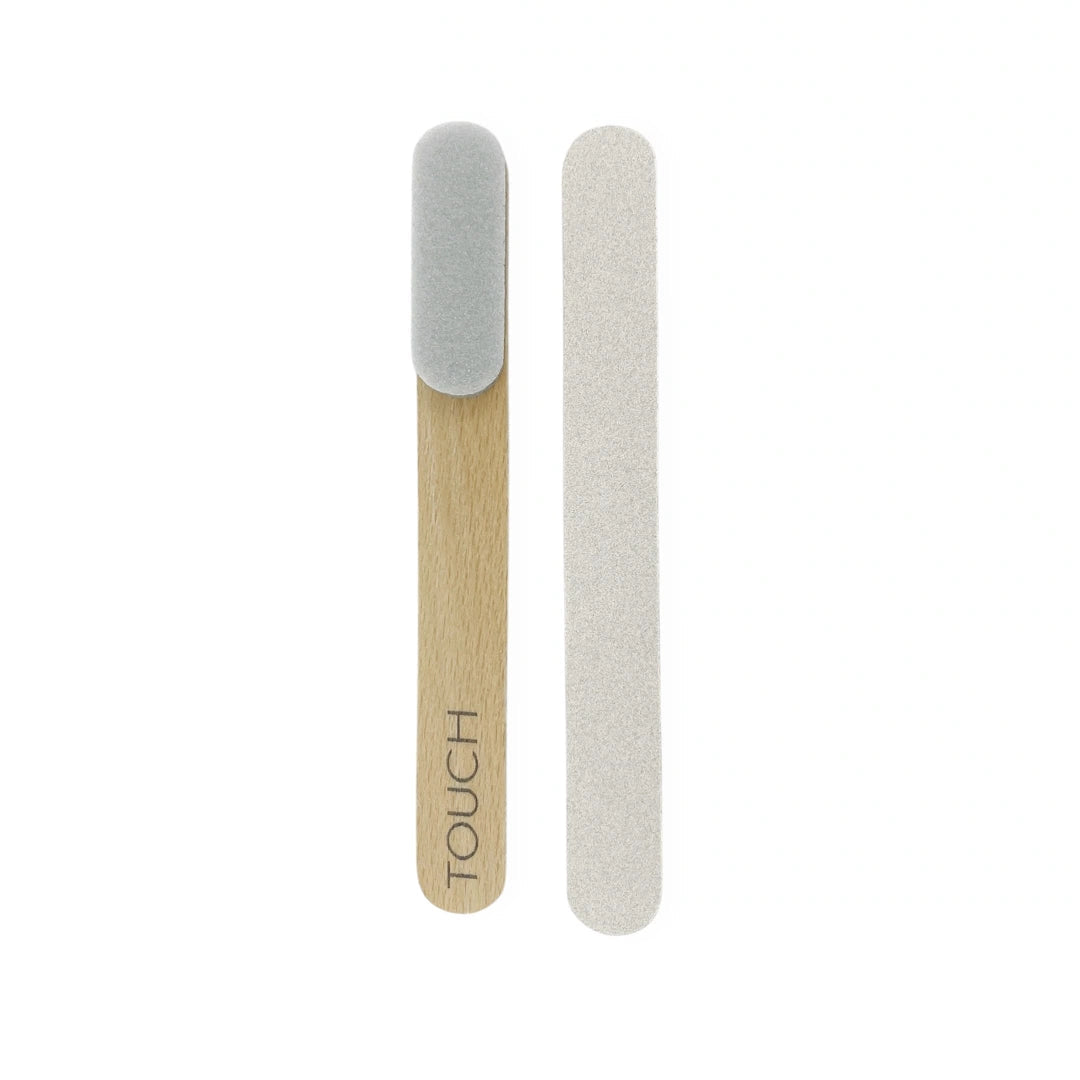 A dual-sided nail file set featuring a wooden handle with a gray abrasive end and the word 'TOUCH' printed on it, shown above a second sanding block on a plain white background.
